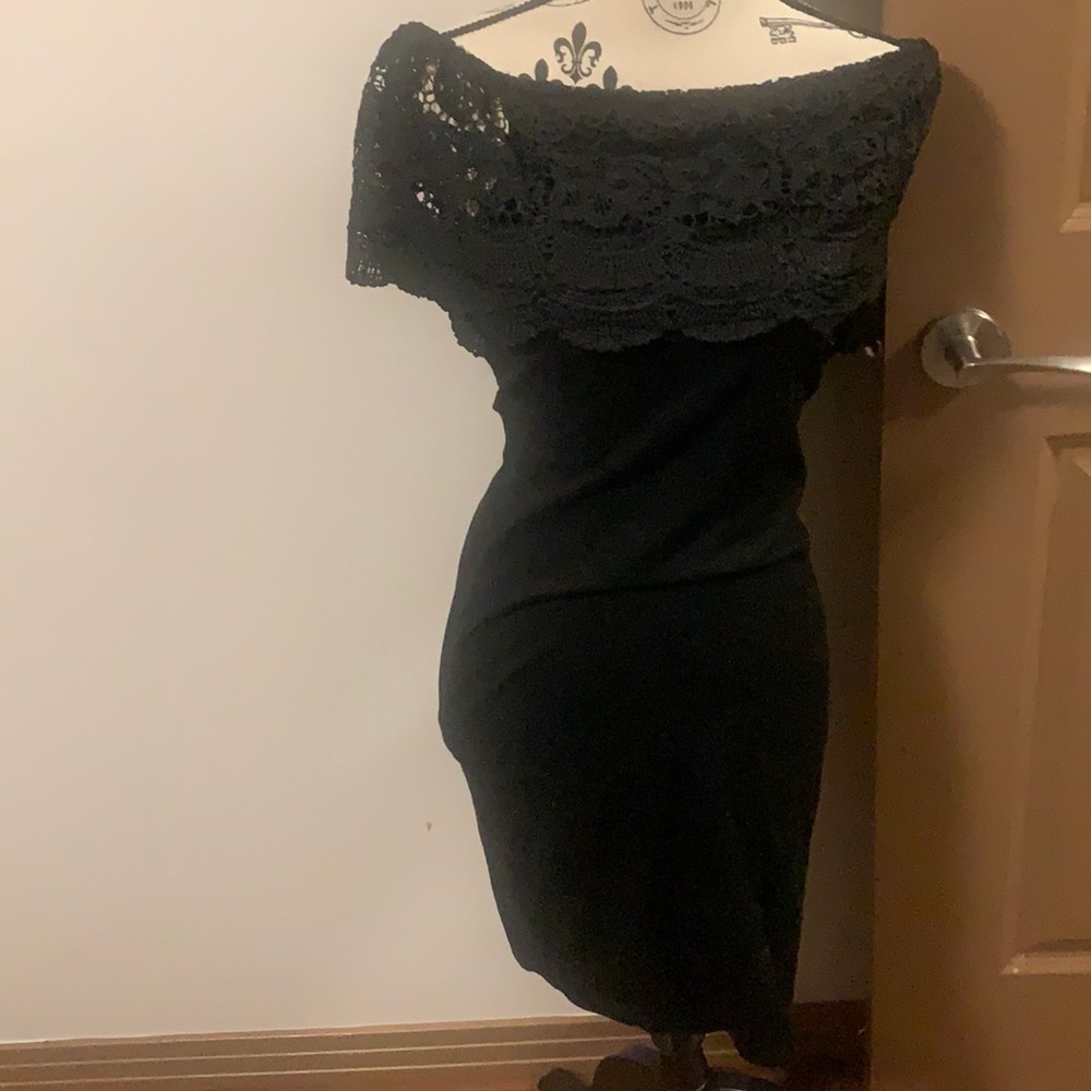 Embroidery top off the should modi’s black dress